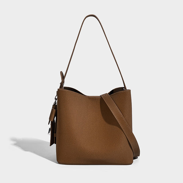 Pebbled leather-look bucket shoulder bag with zip inner pouch and adjustable crossbody strap, detail view 8