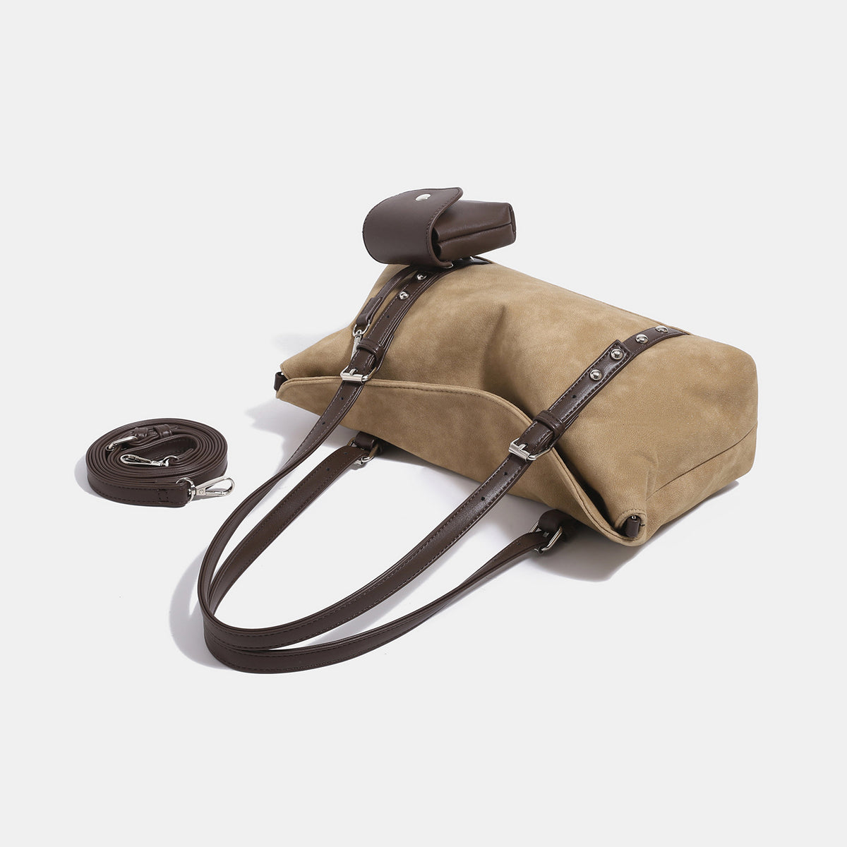 Soft slouchy suede-look shoulder tote with dark brown leather-look trim, silver-tone stud hardware, and attached snap-front