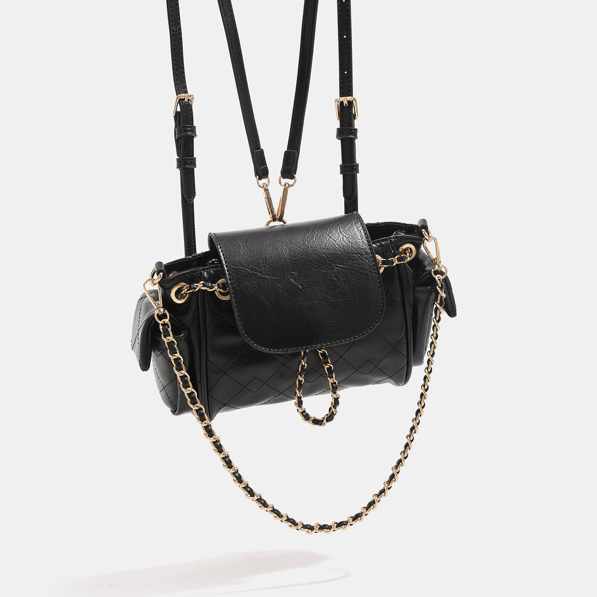 Small quilted leather-look flap bag with gold-tone chain strap and diamond stitch pattern, detail view 3