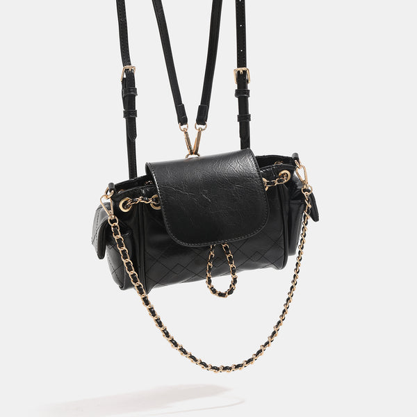 Small quilted leather-look flap bag with gold-tone chain strap and diamond stitch pattern, detail view 3
