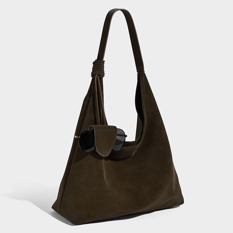 Slouchy oversized matte suede-look shoulder tote bag with knotted strap and attached front flap pouch, front view