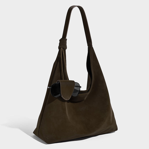 Slouchy oversized matte suede-look shoulder tote bag with knotted strap and attached front flap pouch, front view