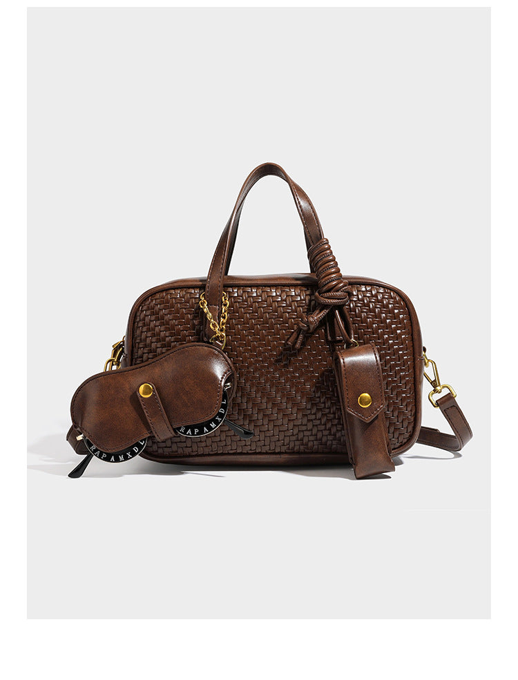 Strukturierte rechteckige Satchel-Tasche mit gewebtem Vorderteil in Lederoptik, goldfarbenen Details, zwei Tragegriffen und abnehmbarem