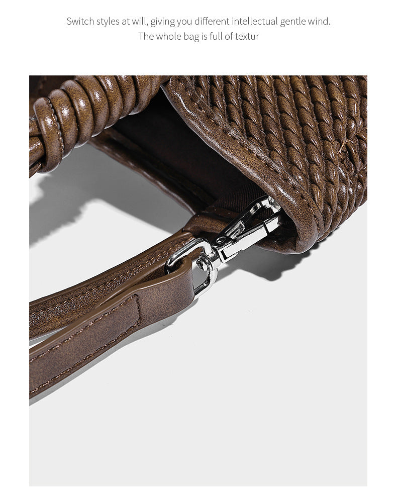 Large structured woven rope-texture tote bag with smooth leather-look trim, knotted dual top handles, detachable mini front