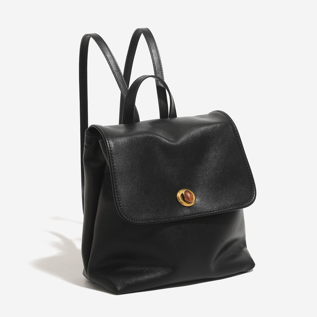 Structured leather-look flap backpack handbag with round gold-tone turn-lock closure and top handle, detail view 2