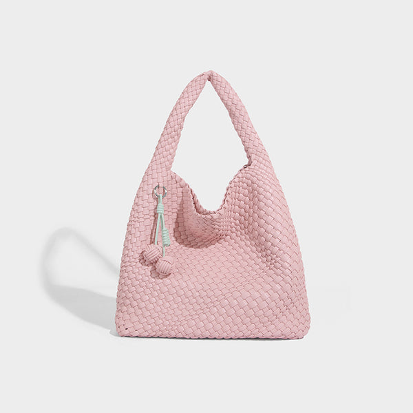 Soft hand-woven slouchy hobo tote bag with knotted tassel charm and single looped shoulder strap, detail view 8