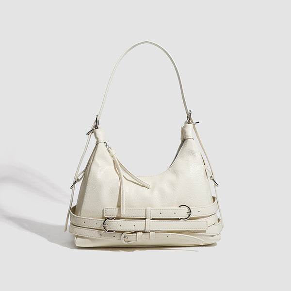 Slouchy hobo shoulder bag in glossy crinkled leather-look finish with silver-tone buckle hardware and slim adjustable strap