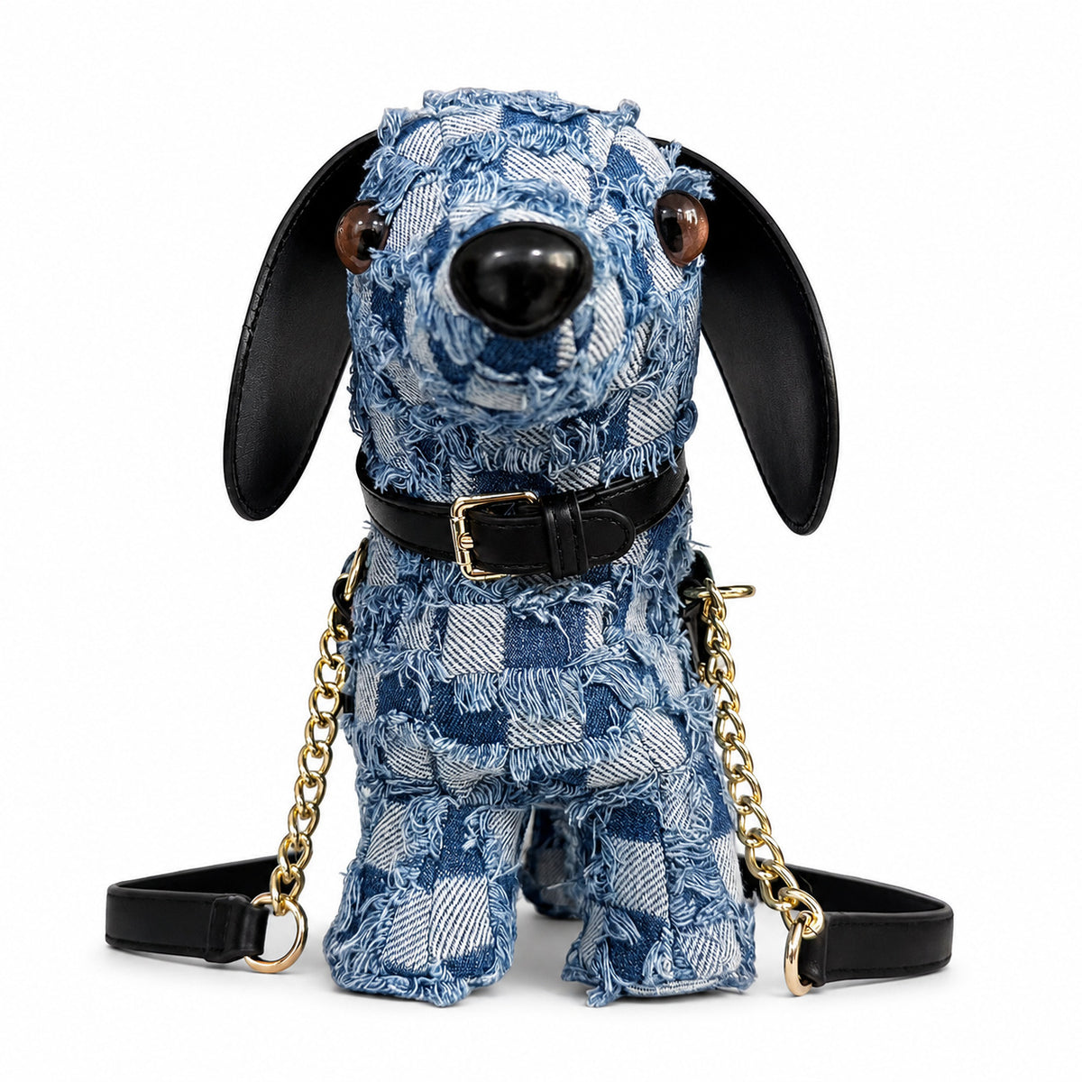 Dachshund-shaped frayed denim patchwork crossbody bag with black leather-look ear, gold-tone chain strap, and front, detail