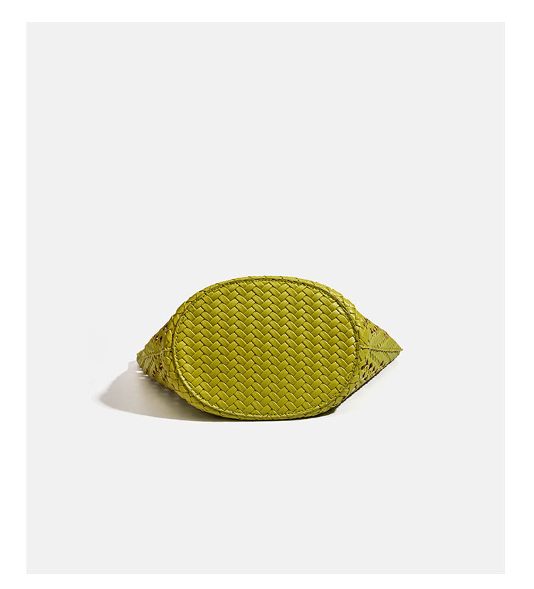 Open-weave lattice bucket tote bag with long knotted cord handles and tapered silhouette, detail view 17