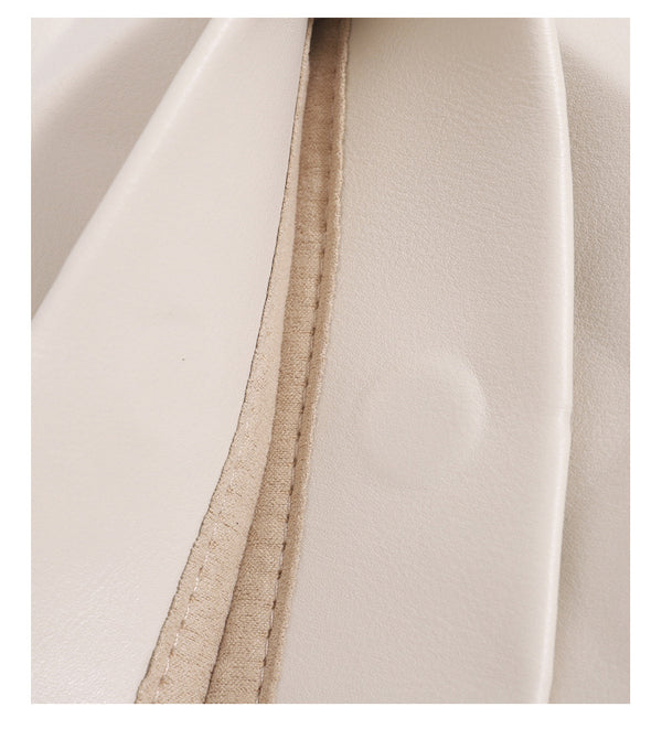 Geometric faceted flap shoulder bag with braided chain strap in black and ivory leather-look finish, detail view 14