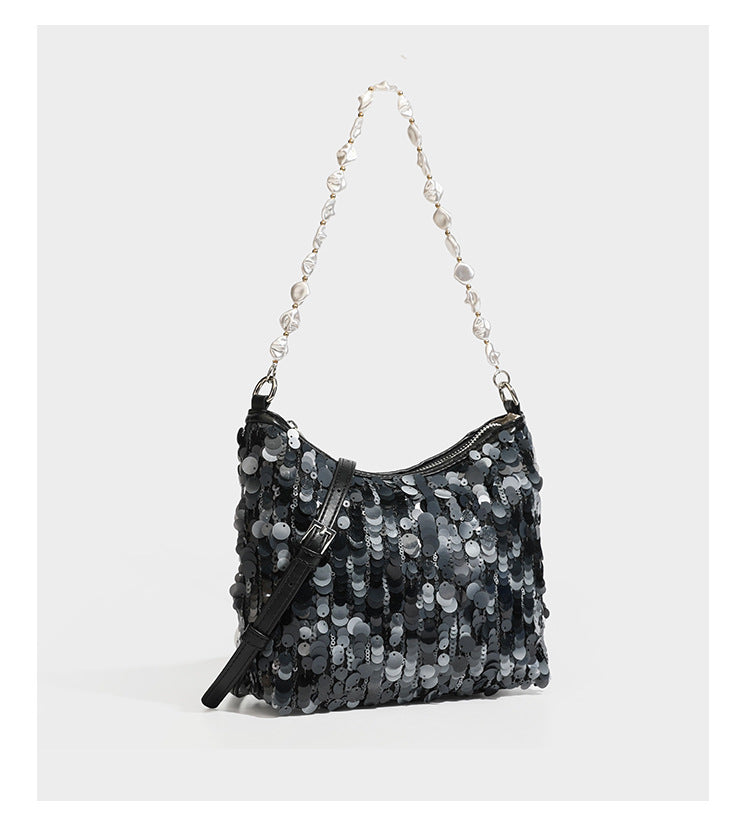 Champagne and ivory large-disc sequin shoulder bag with baroque faux-pearl beaded chain strap and silver-tone zip closure