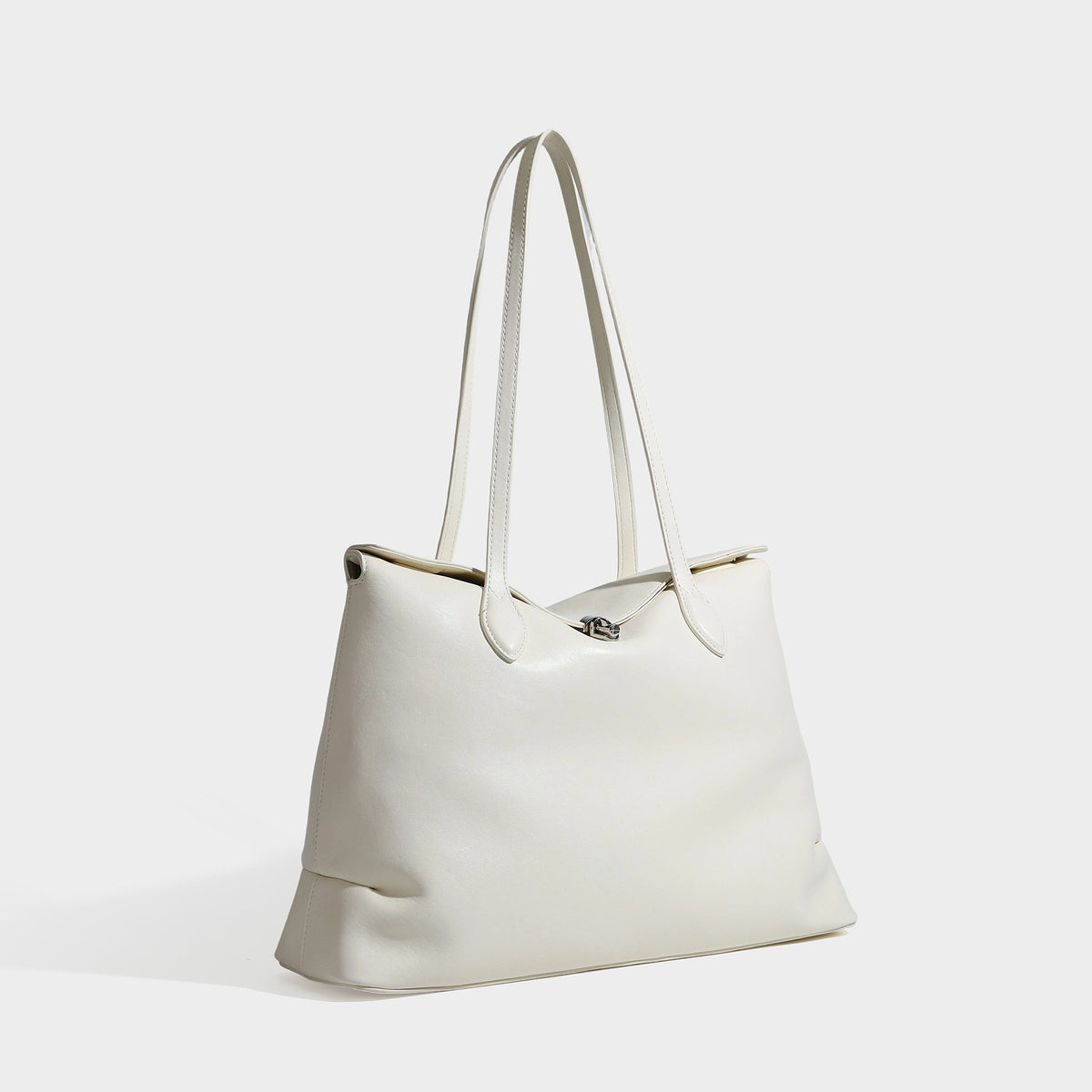 Large leather-look tote shoulder bag with slim double straps and silver-tone turn-lock closure, detail view 4