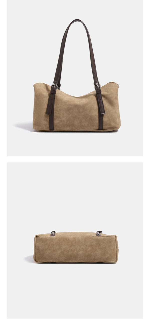 Soft slouchy suede-look shoulder tote with dark brown leather-look trim, silver-tone stud hardware, and attached snap-front