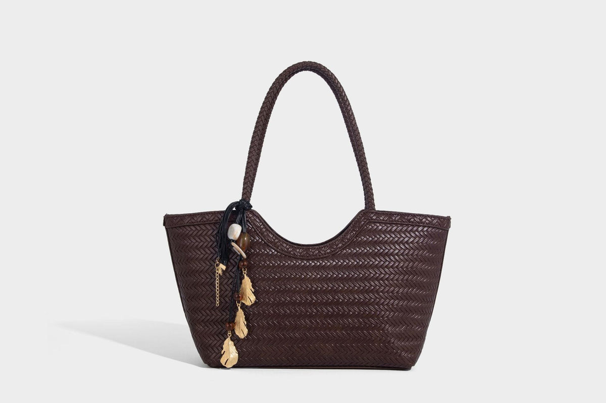Large open-top woven tote bag with contrasting braided double handles and matching drawstring pouch, detail view 28