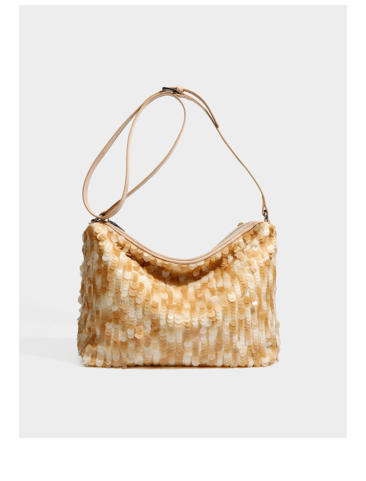 Slouchy paillette sequin hobo shoulder bag with zip closure and adjustable leather-look strap with silver chain hardware
