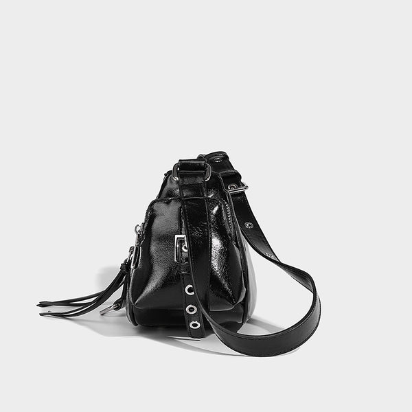 Compact glossy leather-look crossbody bag with silver studs, buckle hardware, and multiple zip pockets, detail view 18
