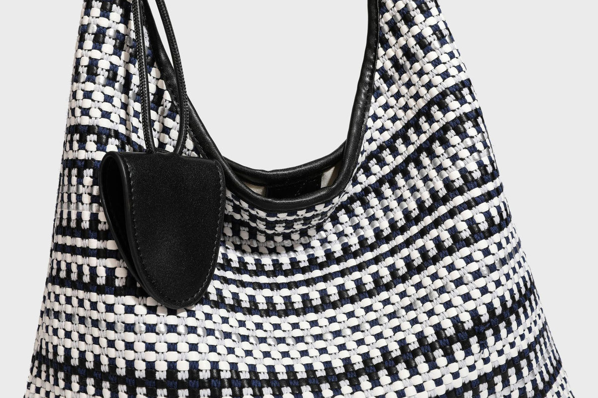 Slouchy woven stripe hobo shoulder bag with black-and-white pattern and leather-look strap, detail view 28