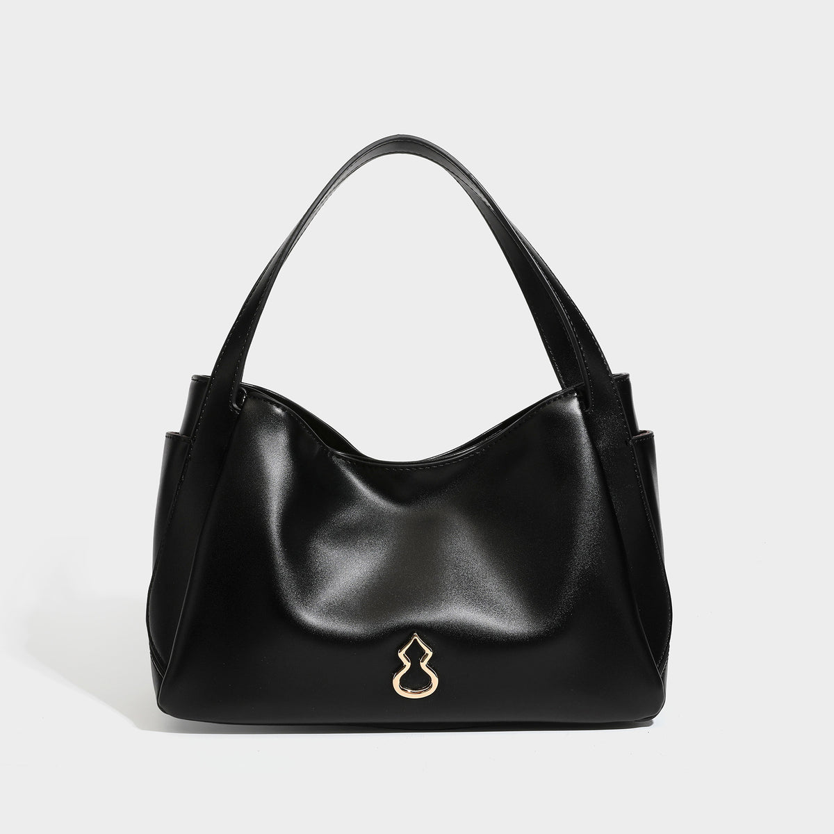 Structured glossy leather-look tote shoulder bag with dual top handles, detachable crossbody strap, side pockets, and, detail