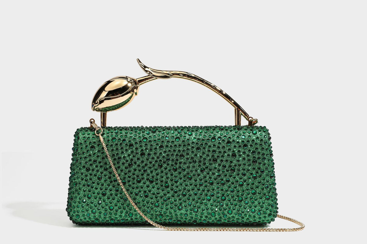 rectangular hard-case rhinestone evening clutch with sculptural gold-tone branch-and-bud top handle and detachable chain