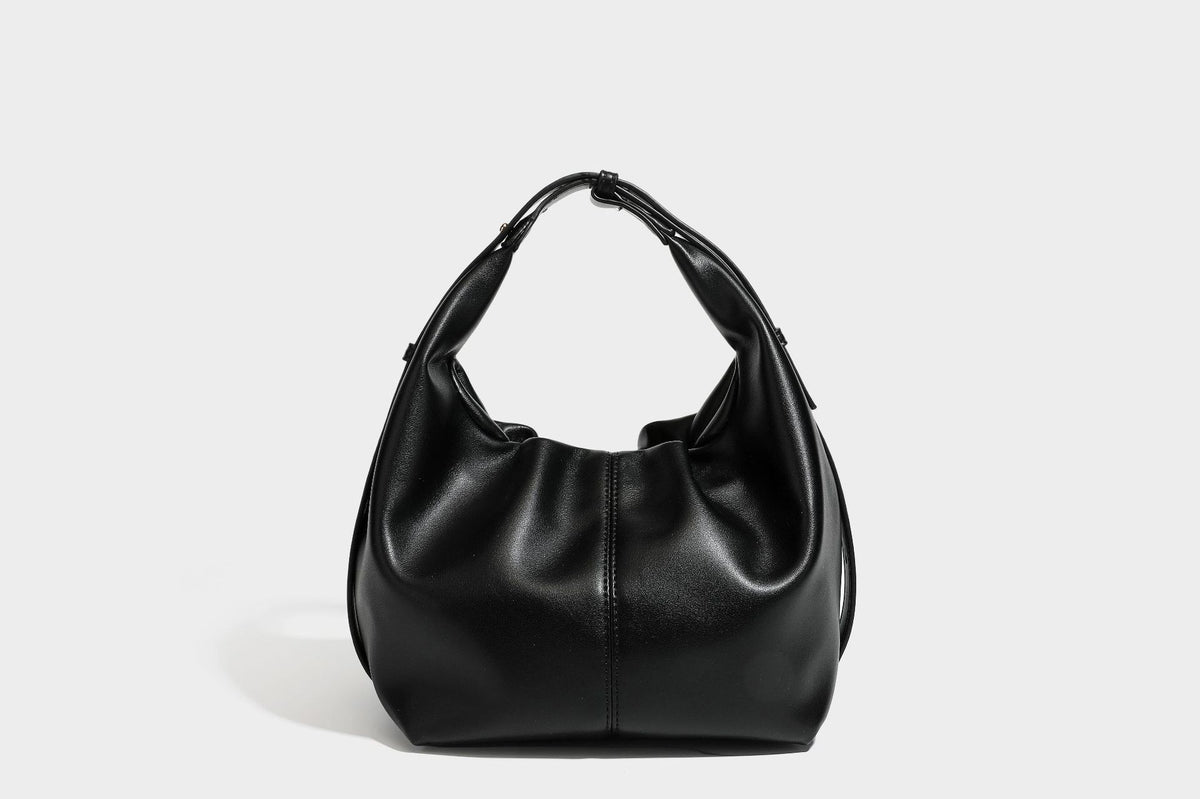 Slouchy hobo bag with smooth leather-look finish, drawstring cinch closure, and gold-tone bead hardware, detail view 27