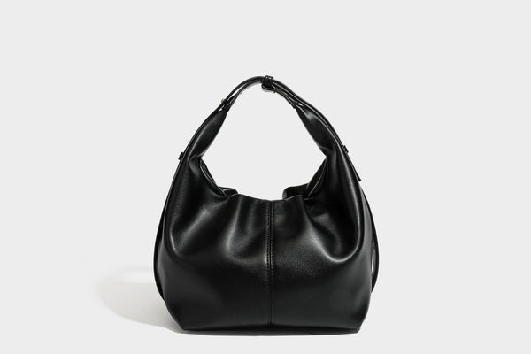 Slouchy hobo bag with smooth leather-look finish, drawstring cinch closure, and gold-tone bead hardware, detail view 27