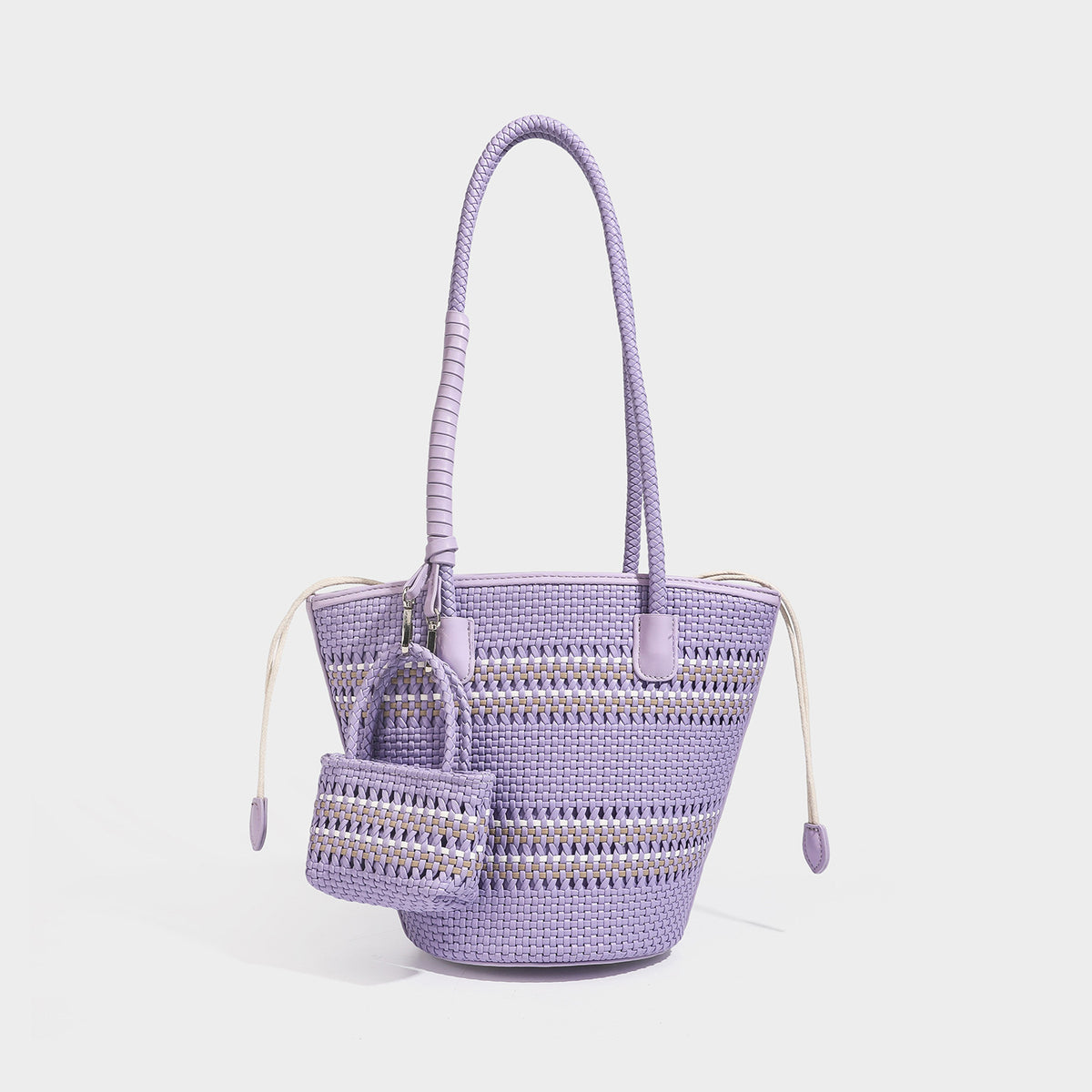 Structured woven bucket tote bag in pastel blue with braided shoulder strap, open lattice weave body, cream drawstring