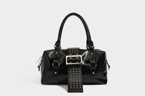 Glossy crinkled barrel handbag with silver stud buckle strap and detachable shoulder strap, detail view 25