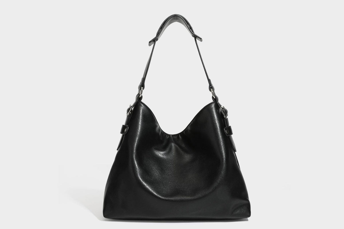 Large slouchy hobo shoulder bag in dark brown with smooth leather-look finish, adjustable strap, and silver-tone hardware