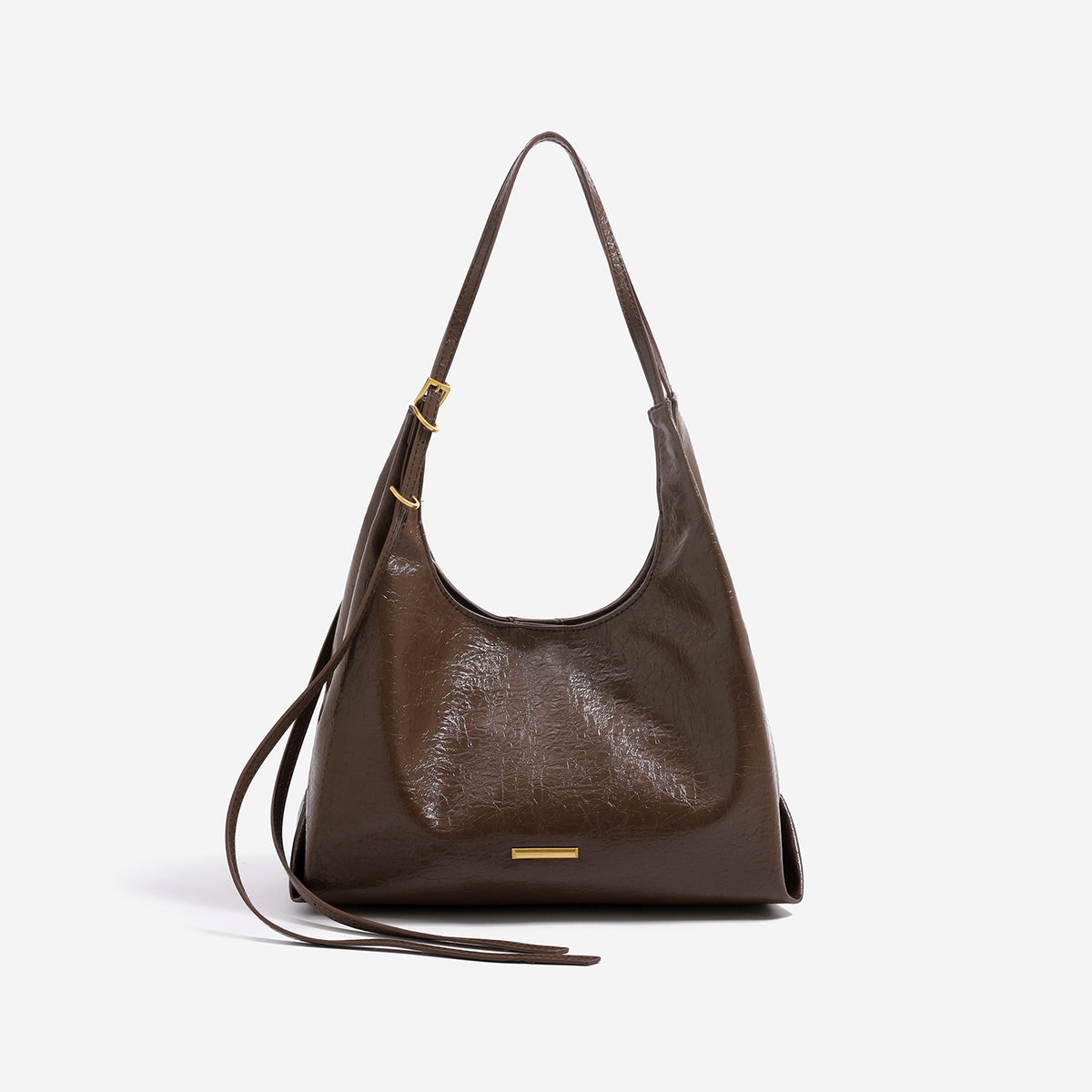 Slouchy hobo shoulder bag in crinkle high-gloss leather-look finish with gold-tone bar hardware and adjustable strap, detail