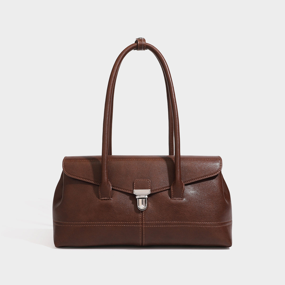 Structured rectangular satchel bag with dual rounded top handles and central metal turn-lock flap closure, detail view 3