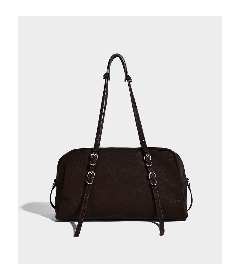 Structured rectangular matte suede-like shoulder bag with silver-tone hardware, zip closure, double top handles, and, detail