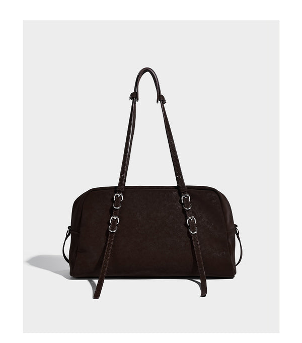Structured rectangular matte suede-like shoulder bag with silver-tone hardware, zip closure, double top handles, and, detail