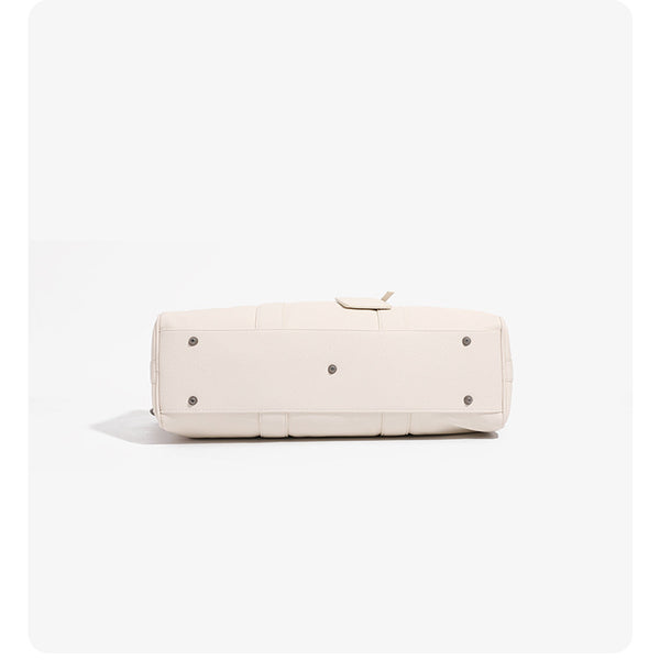 Large cream white pebbled leather-look barrel travel bag with twin top handles, chunky chain shoulder strap, front zip