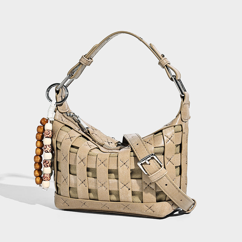 Small woven convertible shoulder bag with top zipper, silver-tone hardware, and detachable crossbody strap, detail view 8