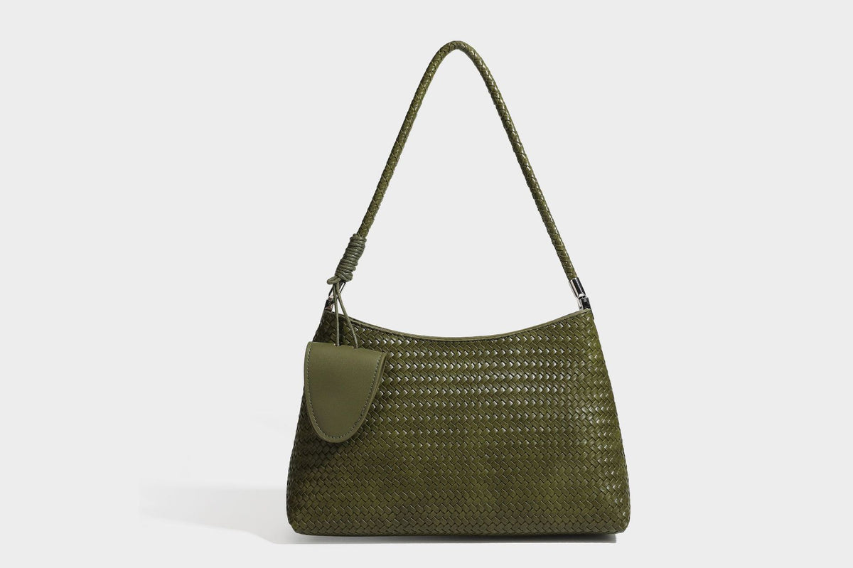 Woven-texture hobo shoulder bag in brown with braided top handle, adjustable crossbody strap, front flap pocket, and, detail