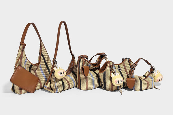 Weich fallender Hobo-Shopper aus gestreiftem Webmaterial in Camel mit mehrfarbigen Streifen und braunem Besatz in Lederoptik, mit abnehmbarem Reißverschluss abgebildet