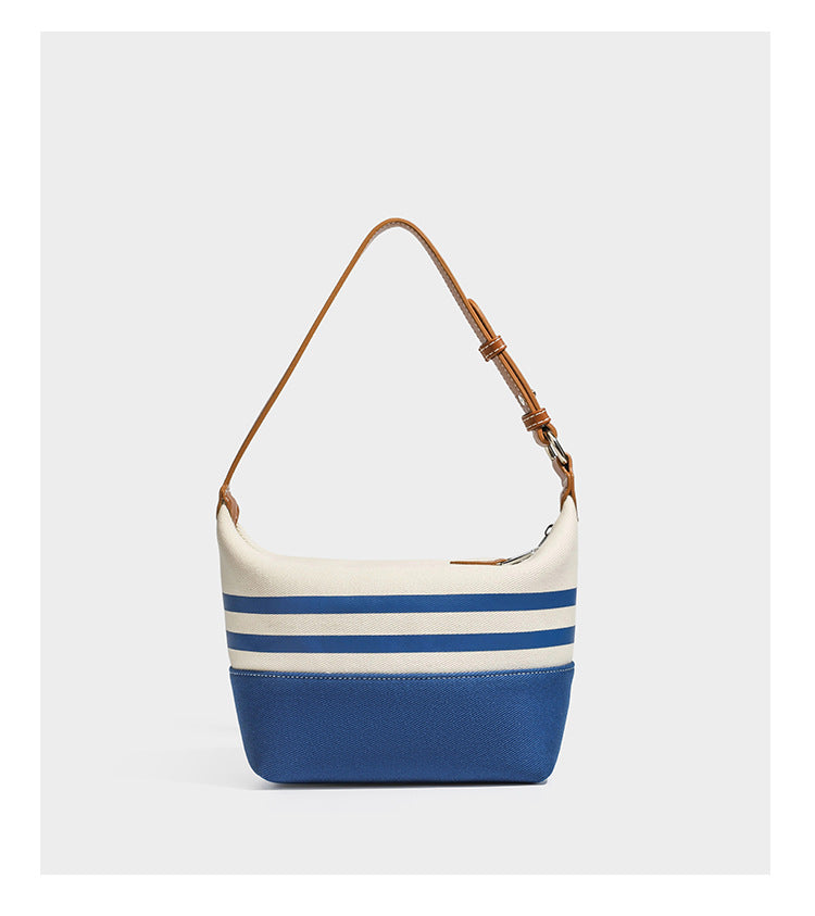 Creme-blau gestreifte Canvas-Schultertasche mit hellbraunem Riemen in Lederoptik und Reißverschluss in Silberoptik, Detailansicht 11