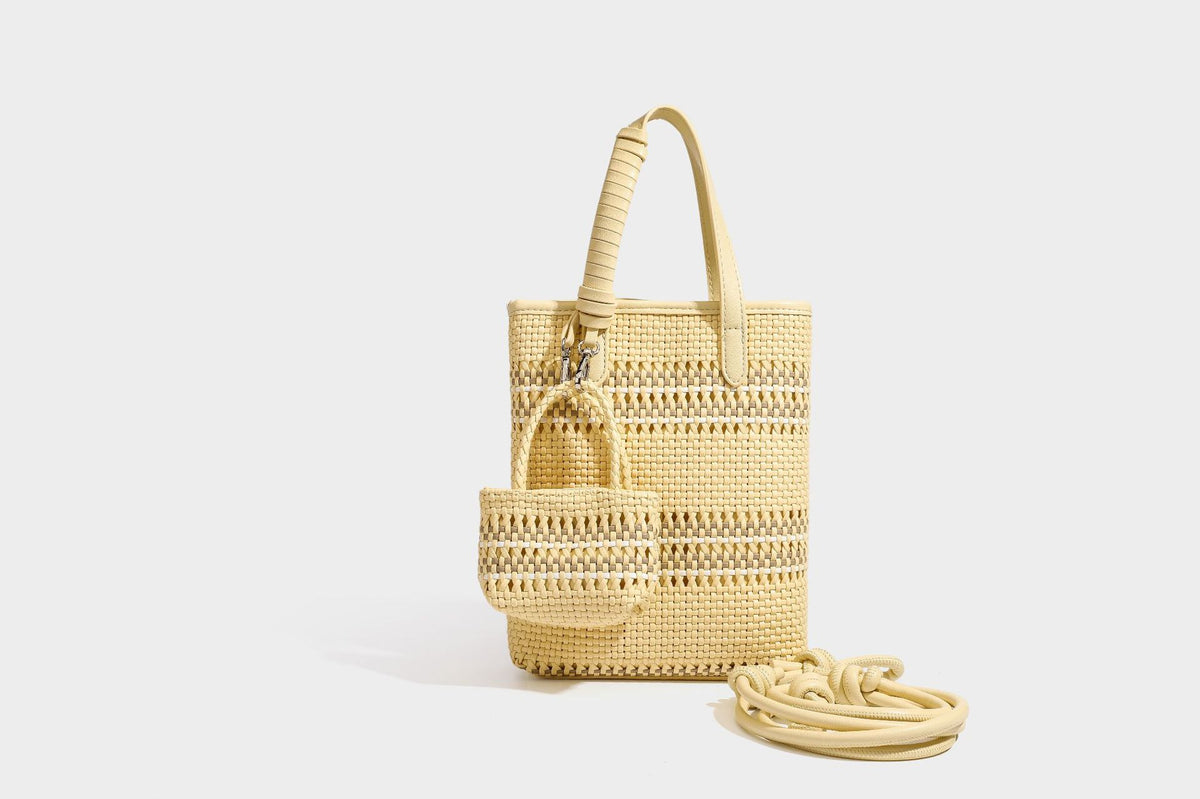 Kleine, formstabile Korb-Shopper-Tasche aus geflochtenem Material mit umwickelten Griffen in Lederoptik und silberfarbenen Verschlussbeschlägen, Detailansicht 43