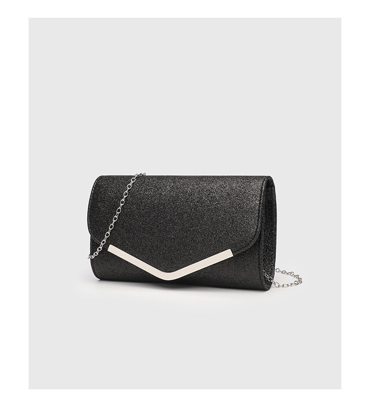 Structured glitter envelope clutch bag with gold-tone V-bar hardware and detachable chain strap, detail view 12
