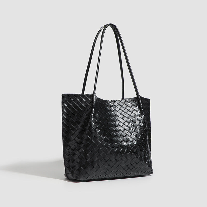 Large black woven leather-look tote bag with twin shoulder straps and matching inner pouch, detail view 3