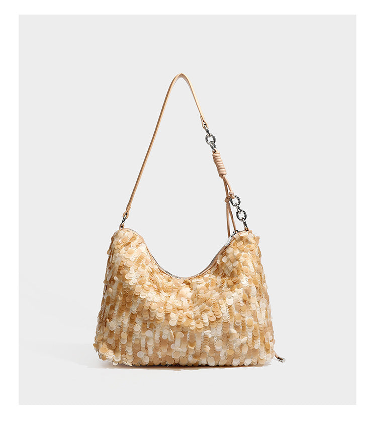 Slouchy paillette sequin hobo shoulder bag with zip closure and adjustable leather-look strap with silver chain hardware