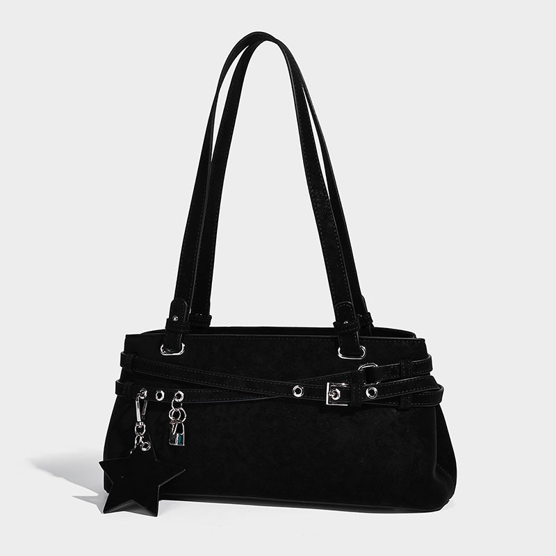 Structured trapezoid shoulder tote in dark brown matte suede-look finish with dual straps, wraparound belt bands
