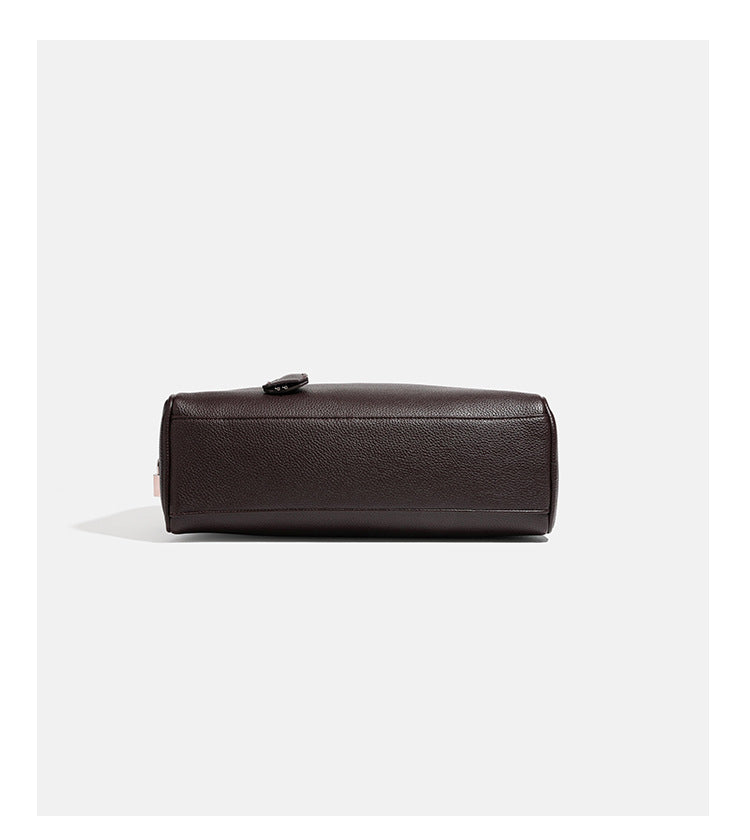 Structured rounded rectangular shoulder bag with pebbled leather-look finish, dual long handles, top zipper, front zip