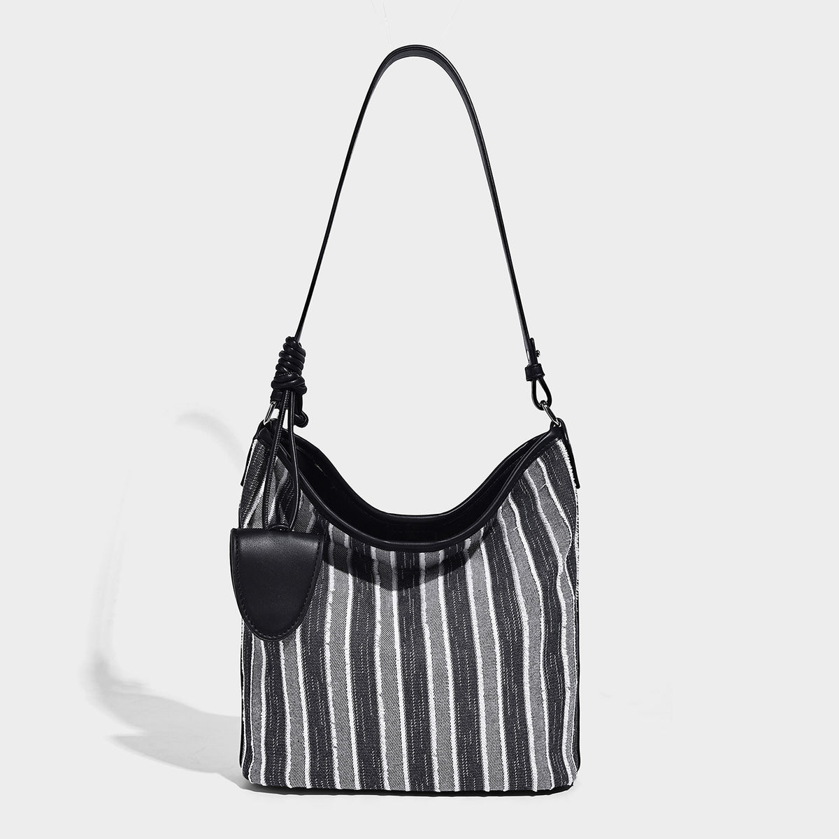 Large striped canvas hobo shoulder bag with cream trim and silver-tone hardware, detail view 7