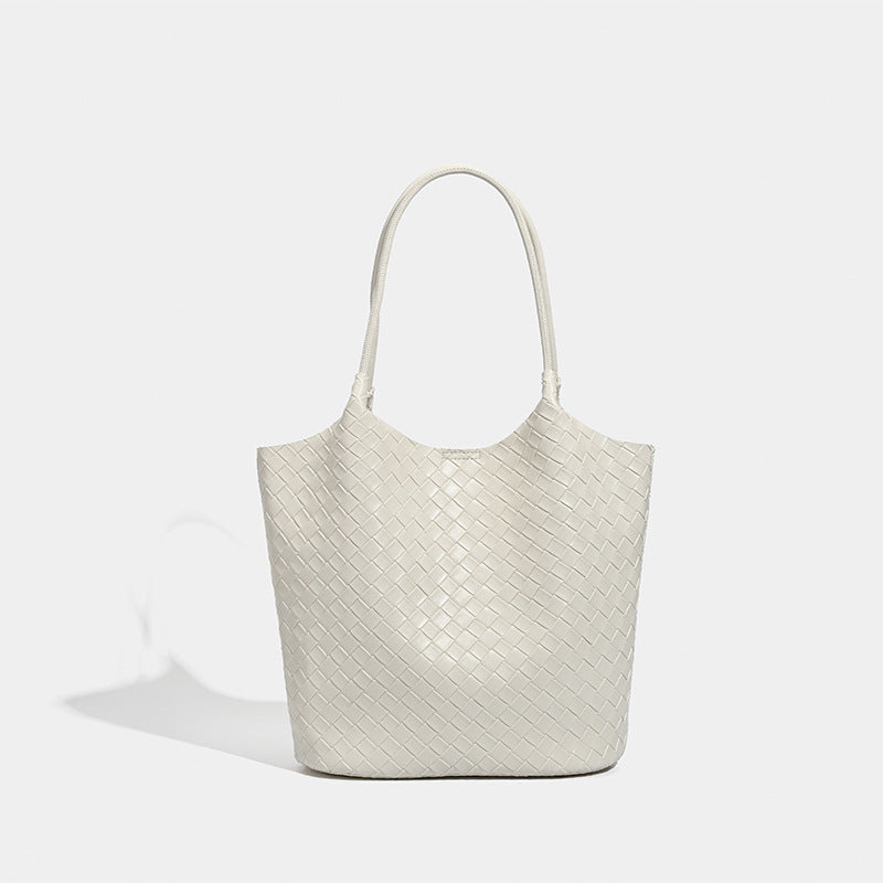 Large woven-texture open-top tote bag with single shoulder strap in butter yellow, detail view 8