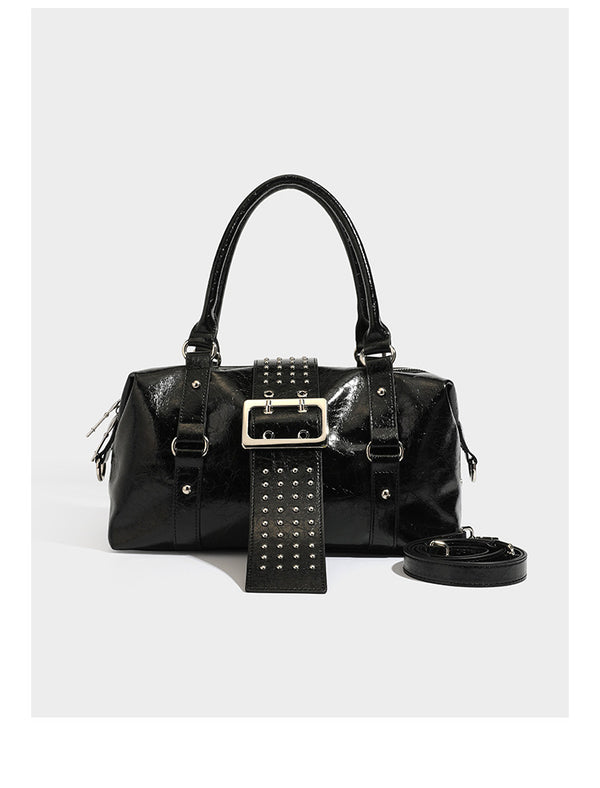 Glossy crinkled barrel handbag with silver stud buckle strap and detachable shoulder strap, detail view 7