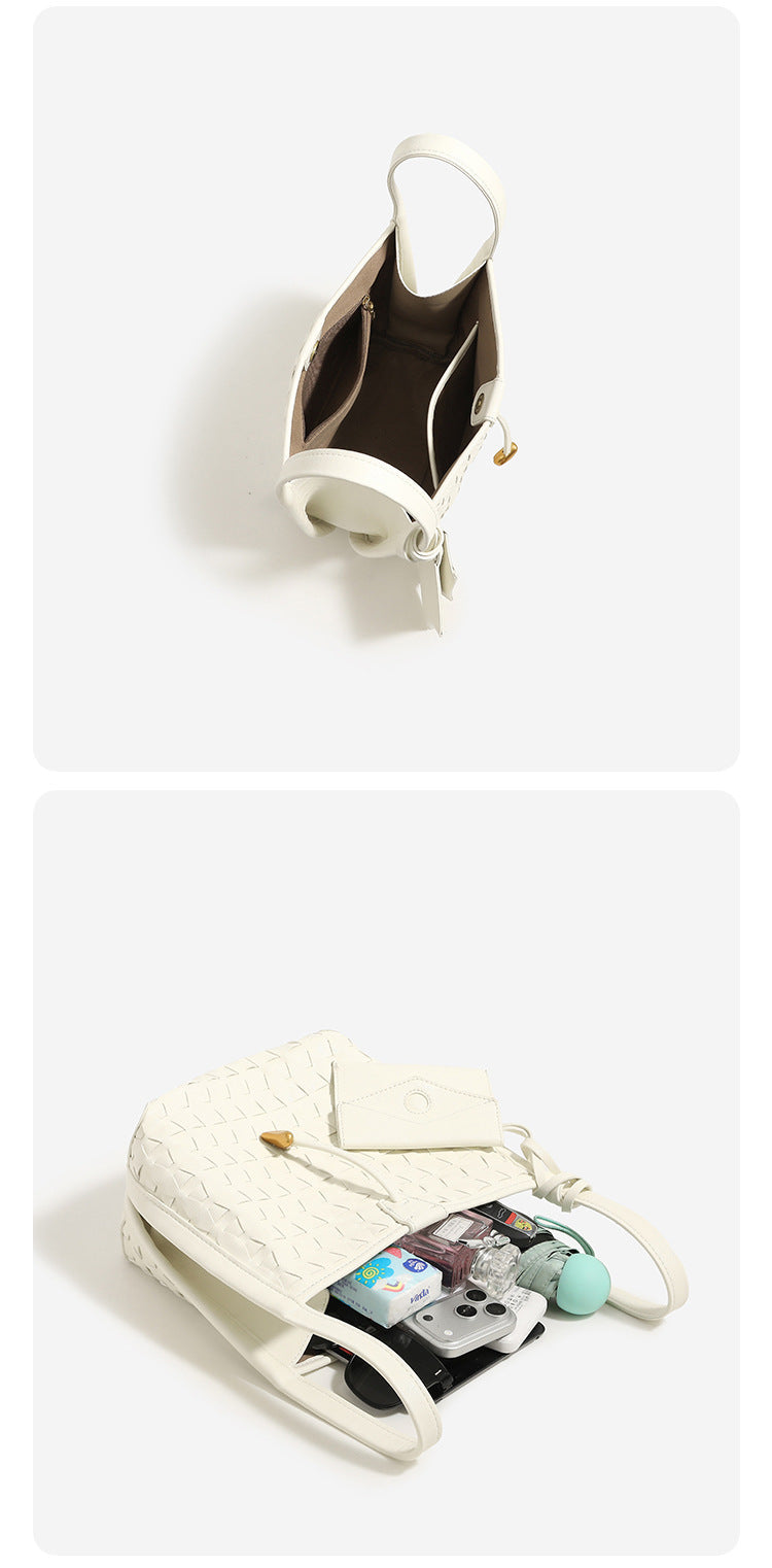 Woven embossed leather-look bucket bag with triangular texture pattern, gold-tone hardware, and attached mini snap pouch