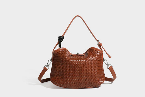 Small woven-look leather-look flap shoulder hobo bag in burgundy with silver-tone hardware and decorative tassel charm
