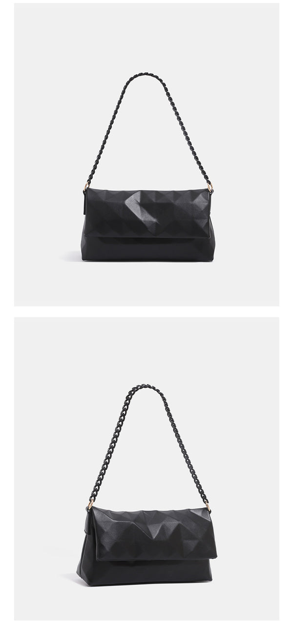 Geometric faceted flap shoulder bag with braided chain strap in black and ivory leather-look finish, detail view 8