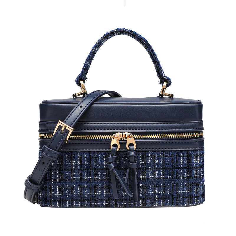 Structured navy tweed and leather-look box mini handbag with gold-tone zipper, braided top handle, and dual detachable